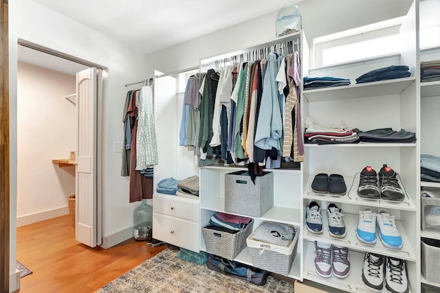 685 Hollibaugh Rd, Stevensville, MT 59870 - walk in closet featuring wood finished floors