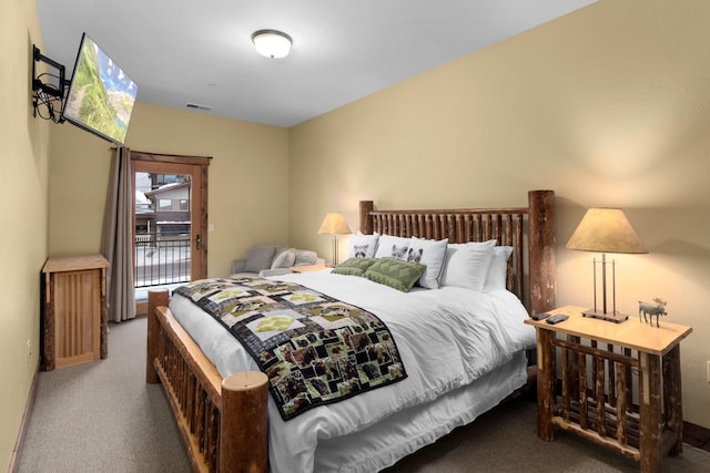 bedroom featuring carpet, access to exterior, and visible vents