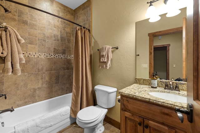 full bathroom featuring toilet, a textured wall, shower / bath combination with curtain, and vanity