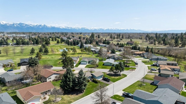 bird's eye view featuring a residential view and a mountain view