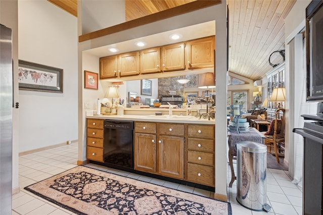 85 Golf Ter, Bigfork, MT 59911 - kitchen with black dishwasher, wooden ceiling, a sink, high vaulted ceiling, and light tile patterned flooring