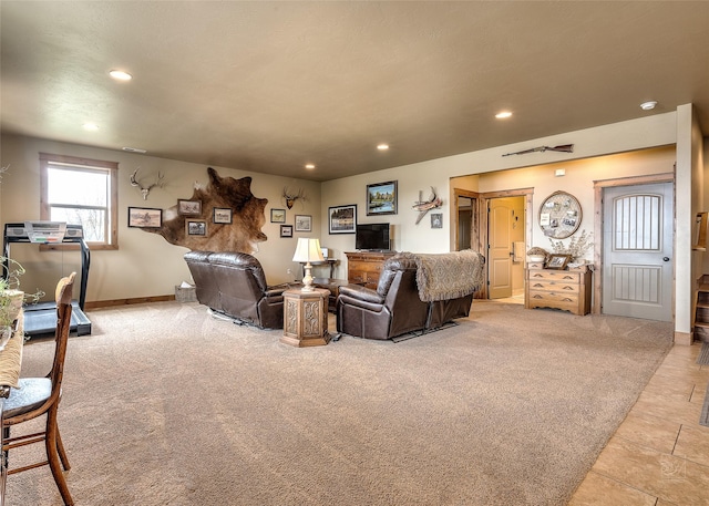 living room with recessed lighting, light tile patterned floors, and light colored carpet