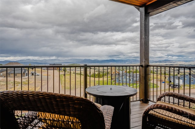 balcony featuring a mountain view