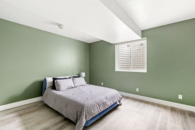 3201 12th St NE, Great Falls, MT 59404 - bedroom featuring baseboards and wood finished floors