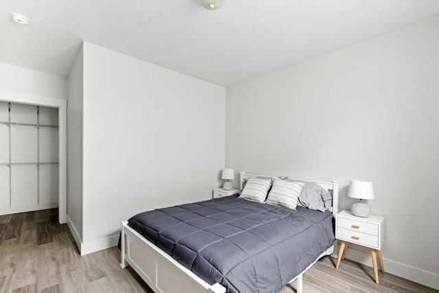 3201 12th St NE, Great Falls, MT 59404 - bedroom with light wood-type flooring and baseboards