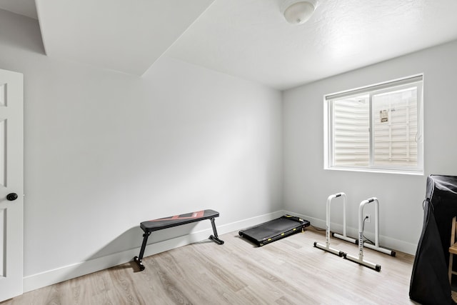 3201 12th St NE, Great Falls, MT 59404 - workout area with baseboards and wood finished floors