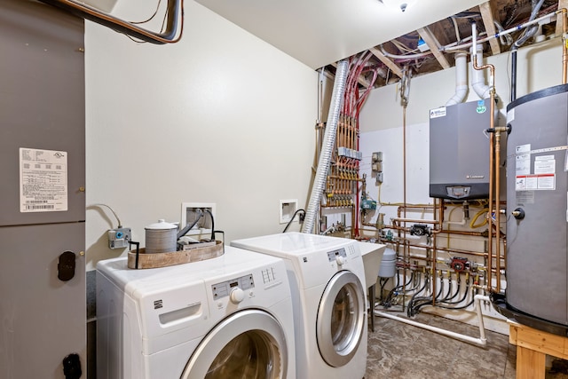 3201 12th St NE, Great Falls, MT 59404 - laundry area featuring independent washer and dryer, laundry area, and tankless water heater