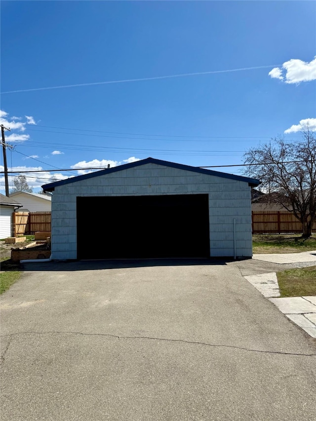 detached garage with fence