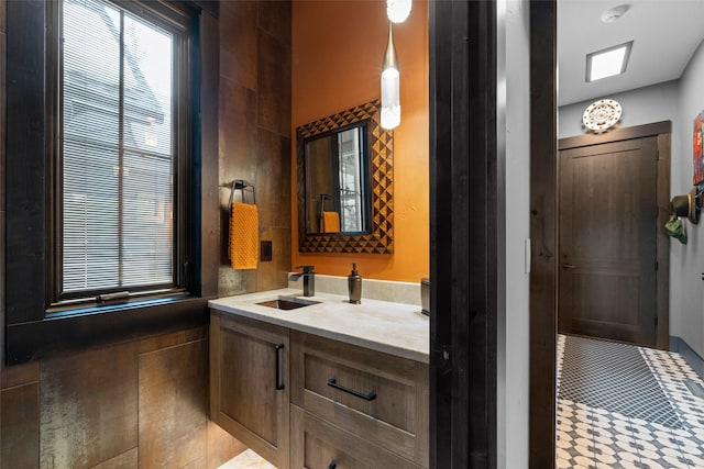 bathroom with vanity and tile patterned floors