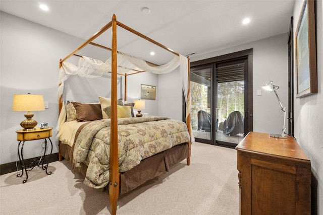 carpeted bedroom featuring access to outside, recessed lighting, and visible vents