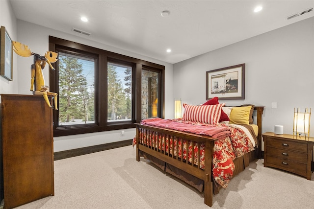 bedroom featuring carpet floors, recessed lighting, and visible vents