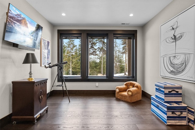 sitting room with baseboards, recessed lighting, wood-type flooring, and visible vents