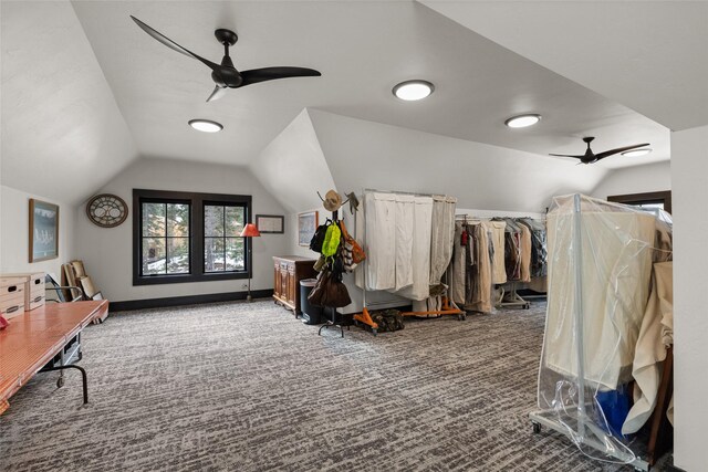 additional living space featuring ceiling fan, carpet, and lofted ceiling