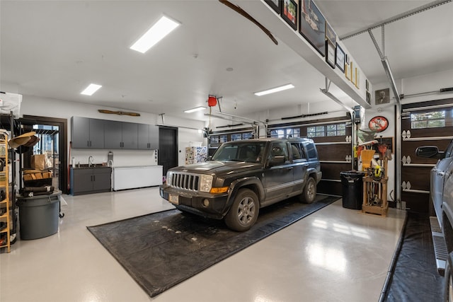 garage featuring a sink