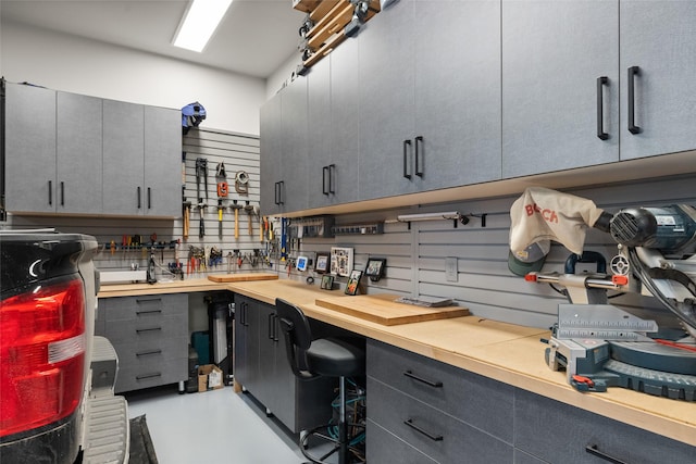 interior space with concrete floors and a workshop area