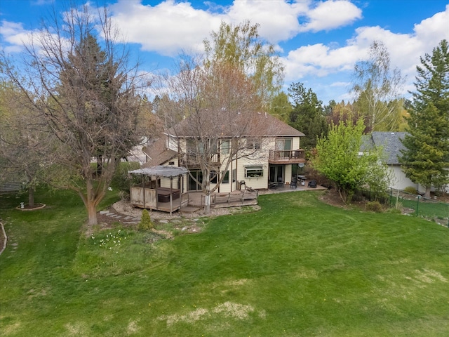 128 River View Dr, Kalispell, MT 59901 - rear view of property with a wooden deck and a patio area