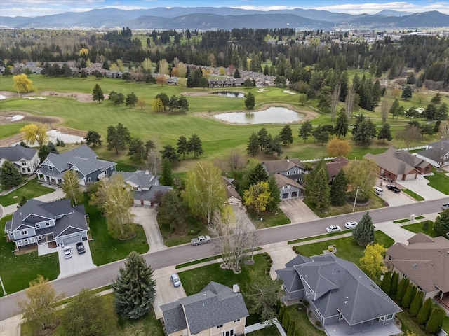 128 River View Dr, Kalispell, MT 59901 - aerial overview of property's location with a water and mountain view and nearby suburban area