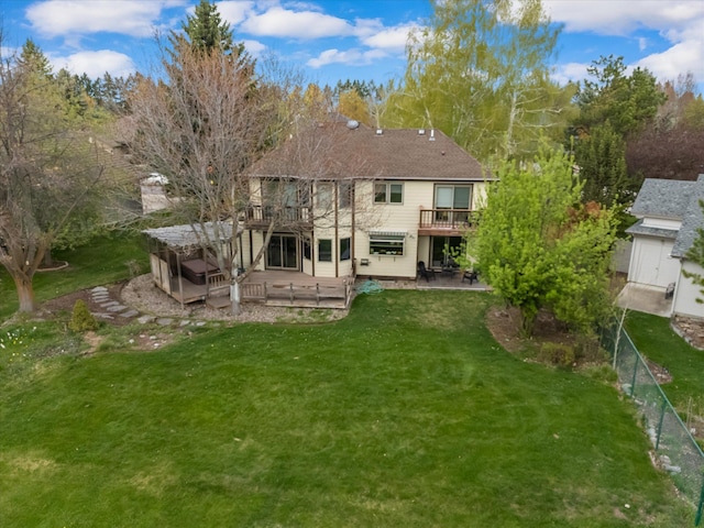 128 River View Dr, Kalispell, MT 59901 - back of property featuring a wooden deck and a patio