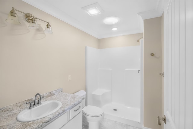 bathroom with vanity, ornamental molding, toilet, and a shower
