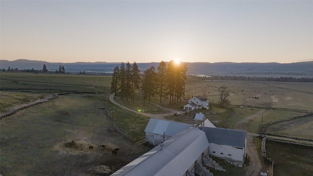 aerial view featuring a mountain view and a rural view