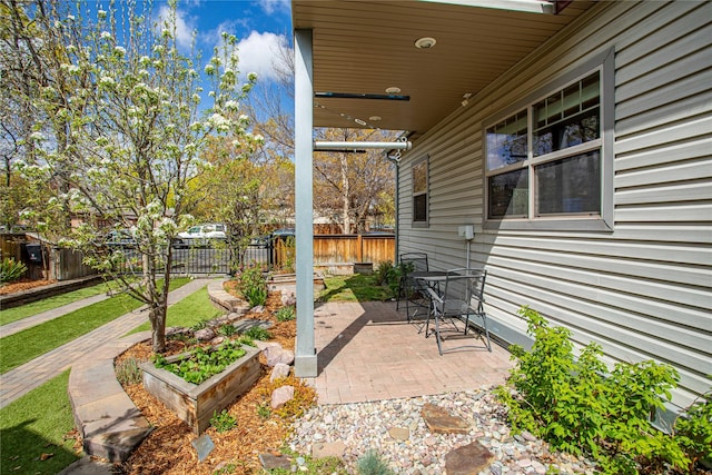 view of patio with fence