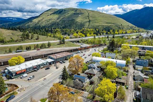 drone / aerial view featuring a mountain view