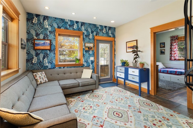sitting room featuring recessed lighting, baseboards, and wallpapered walls