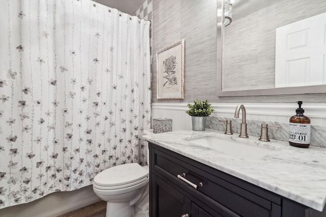 full bathroom with vanity, toilet, wood finished floors, and a shower with shower curtain