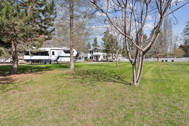 view of yard with fence