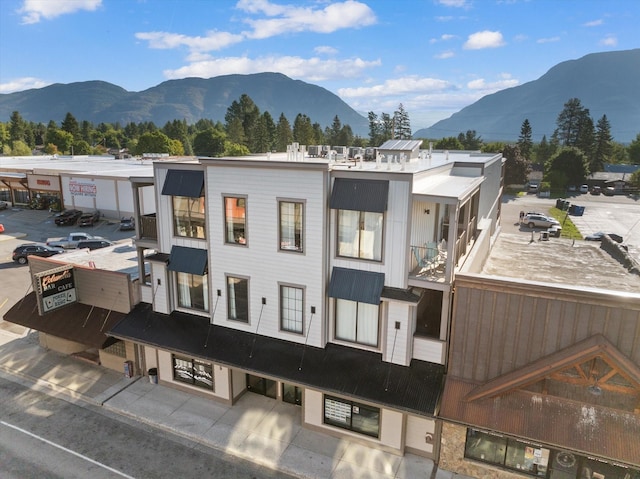 exterior space featuring a mountain view