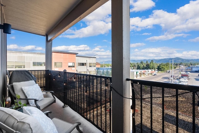 balcony featuring a mountain view