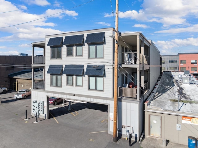 view of building exterior featuring parking