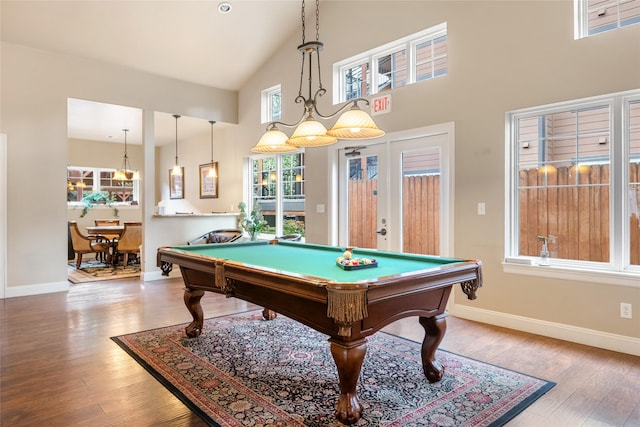 recreation room with wood finished floors, baseboards, a high ceiling, french doors, and billiards