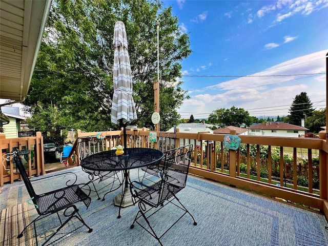 wooden deck with outdoor dining space