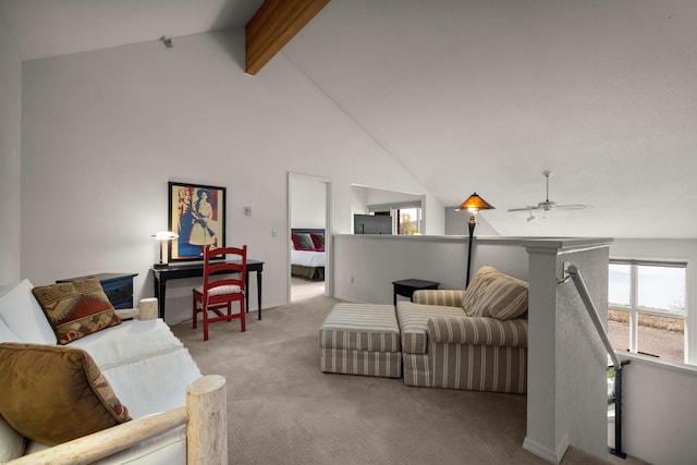 living room featuring high vaulted ceiling, a ceiling fan, beam ceiling, and light colored carpet