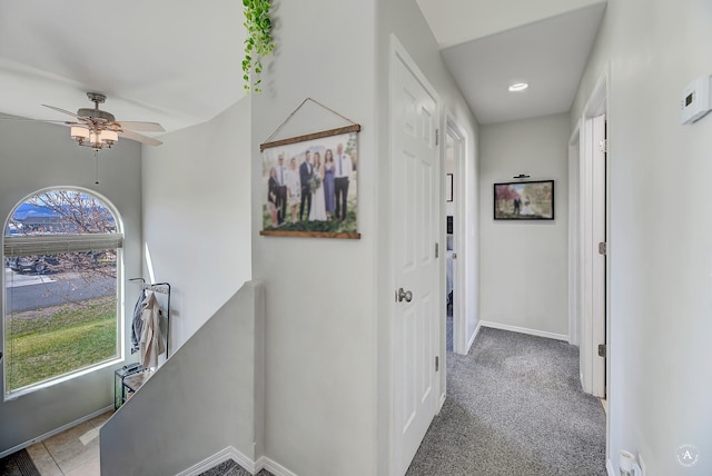 corridor with recessed lighting, baseboards, and carpet