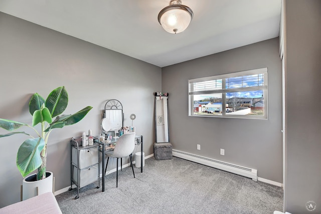 office space featuring carpet flooring, baseboards, and baseboard heating