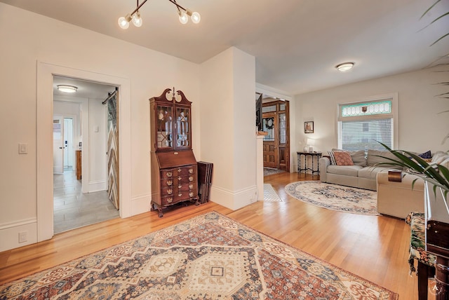 615 Dearborn Ave Unit 320Power, St, Helena, MT 59601 - living room featuring baseboards and wood finished floors