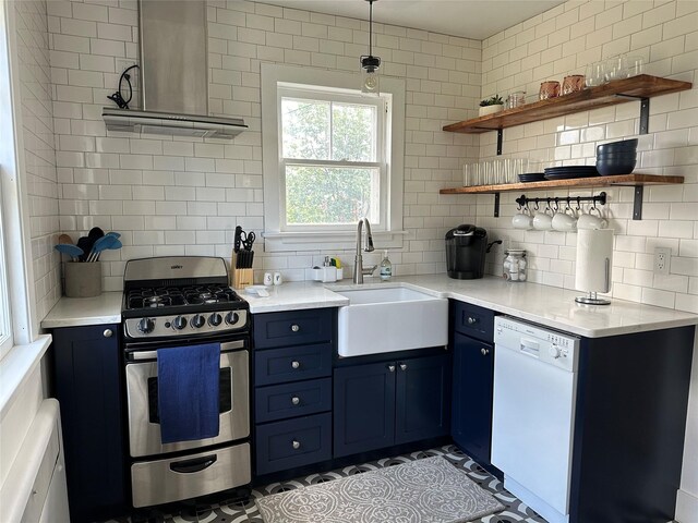 615 Dearborn Ave Unit 320Power, St, Helena, MT 59601 - kitchen with stainless steel range with gas cooktop, white dishwasher, a sink, and blue cabinetry