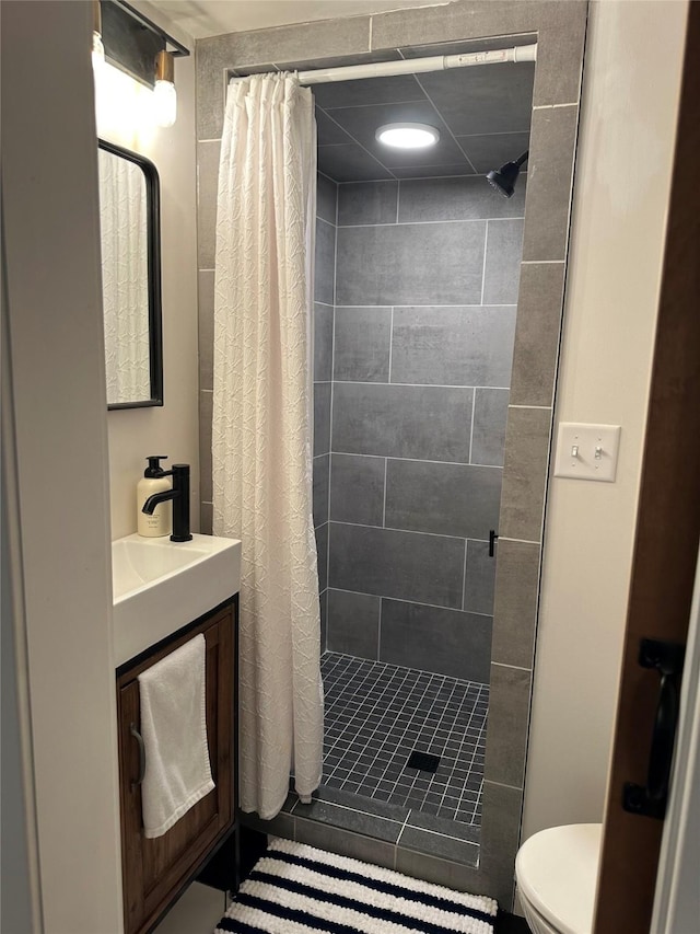 615 Dearborn Ave Unit 320Power, St, Helena, MT 59601 - bathroom featuring vanity, toilet, and a shower stall