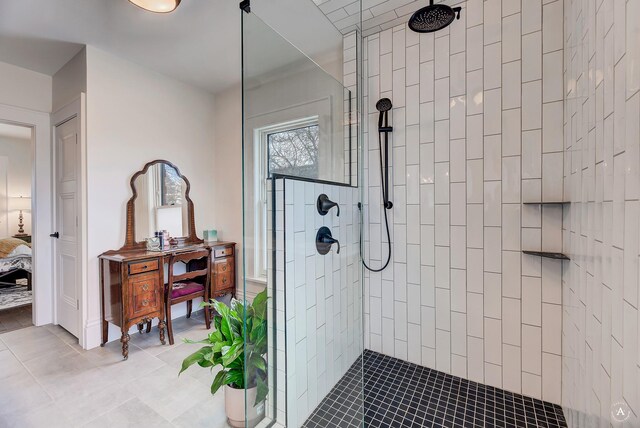 320 Power St, Helena, MT 59601 - ensuite bathroom featuring connected bathroom, tiled shower, tile patterned flooring, and vanity