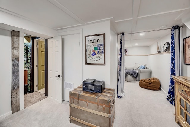 hall with carpet flooring, recessed lighting, baseboards, and visible vents
