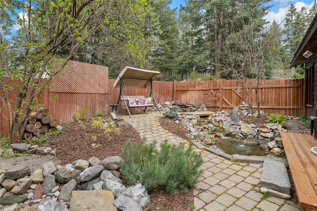view of yard featuring a fenced backyard