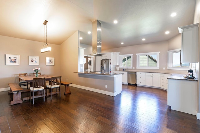 kitchen with dark wood-style flooring, island range hood, white cabinetry, and stainless steel appliances