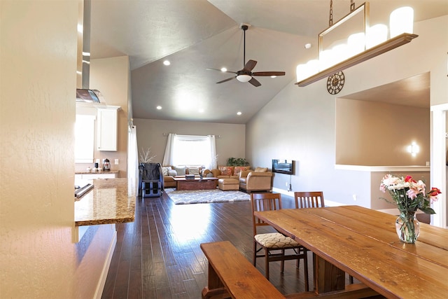 dining area featuring dark wood-type flooring, recessed lighting, ceiling fan, and high vaulted ceiling