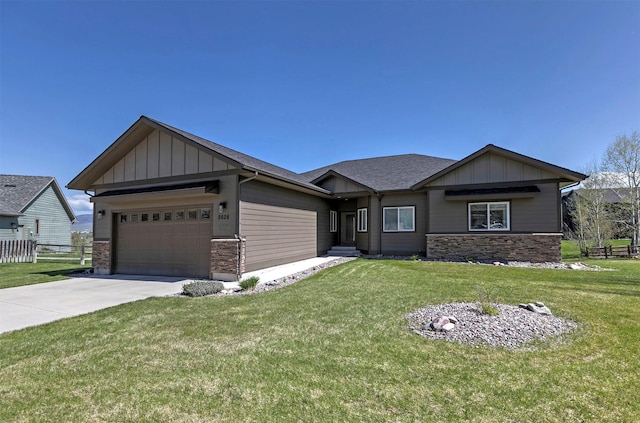 craftsman inspired home featuring a garage, a front lawn, fence, board and batten siding, and driveway