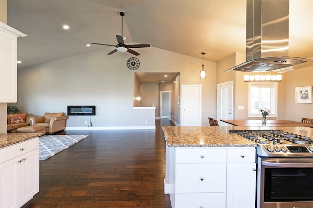 kitchen with ceiling fan, ventilation hood, stainless steel range with gas stovetop, open floor plan, and dark wood-style floors