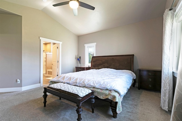 bedroom with lofted ceiling, baseboards, connected bathroom, a ceiling fan, and carpet