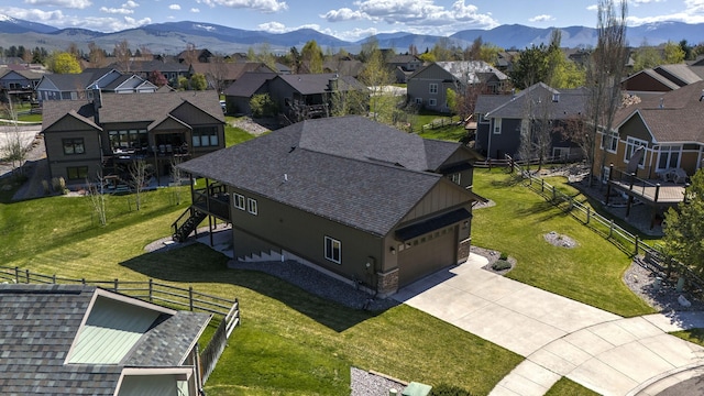 aerial view featuring a residential view and a mountain view