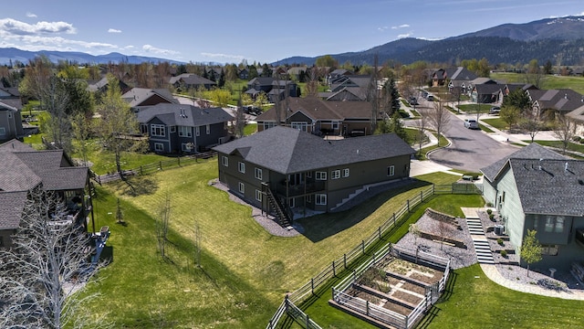 bird's eye view featuring a residential view and a mountain view
